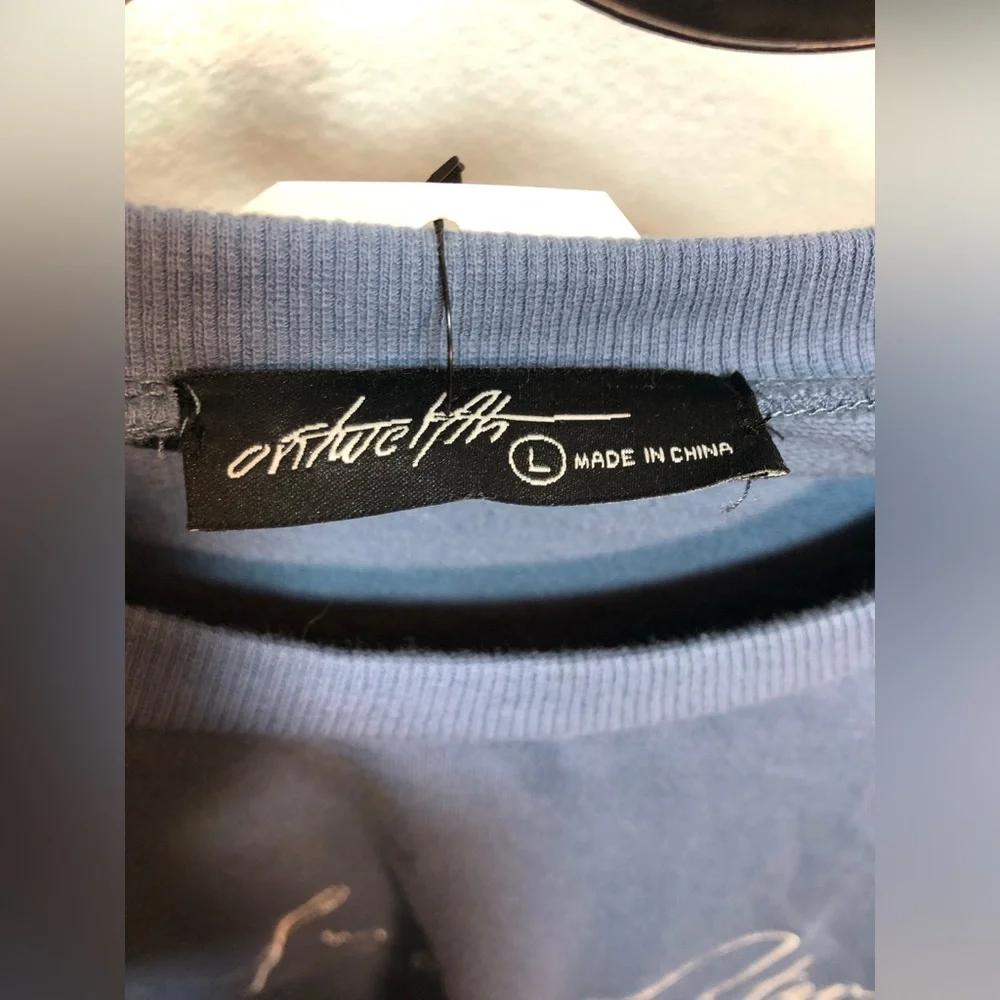 Blue Lucky Star Sweatshirt with Silver Star Accents